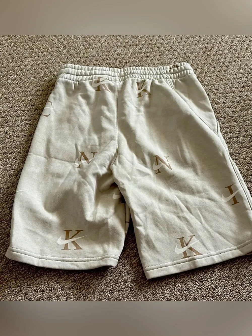 Nike boys shorts, cotton, tan with letters and checks, youth XL (14-16)